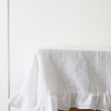 Flying tablecloth made of white cotton gas and mismatched towels