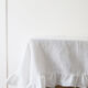 Nappe volantée en gaze de coton blanche et serviettes vichy jaune