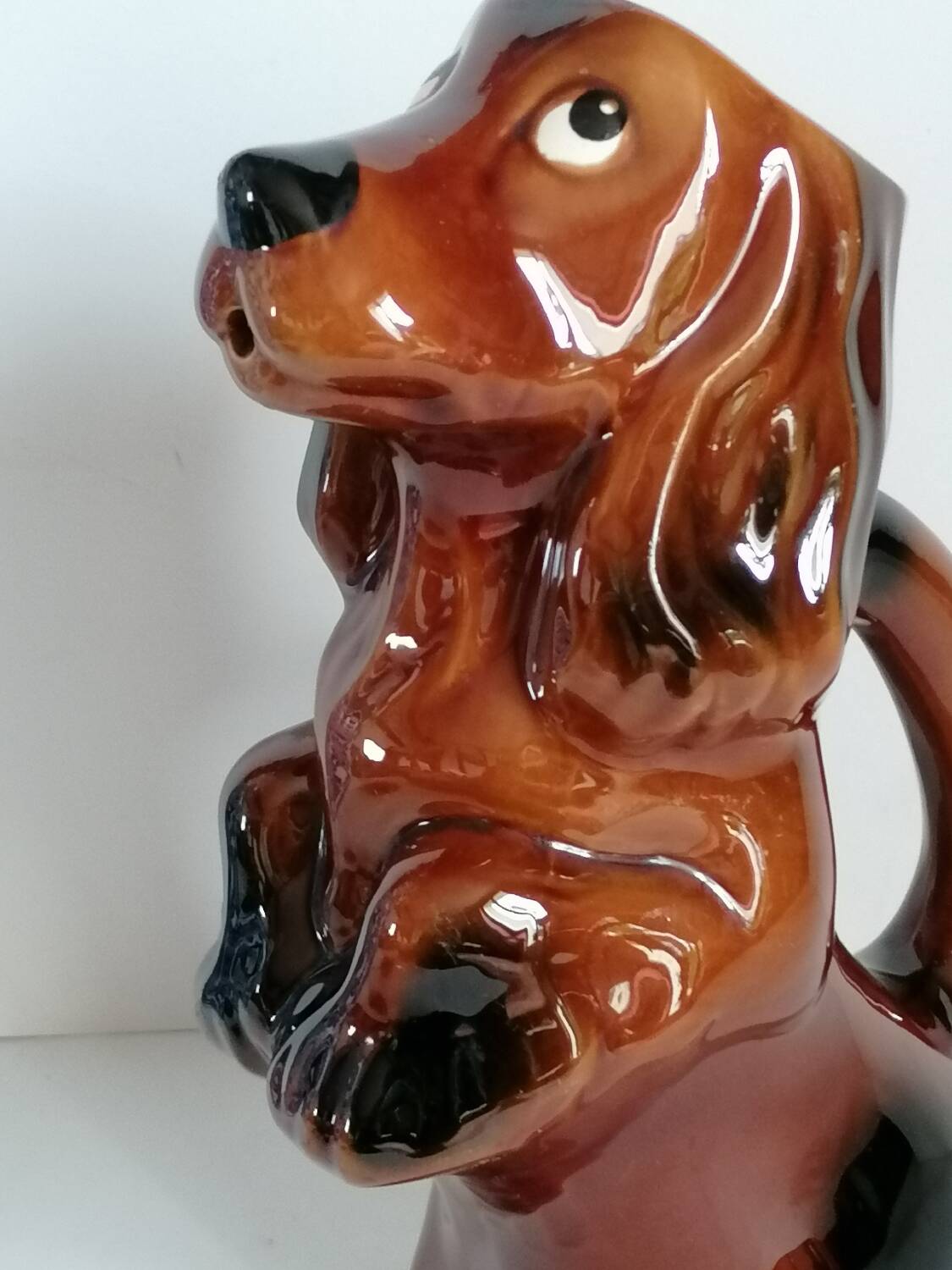 Zoomorphic dachshund dog pitcher in majolica slip