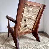 Reconstruction armchair in teak and caning