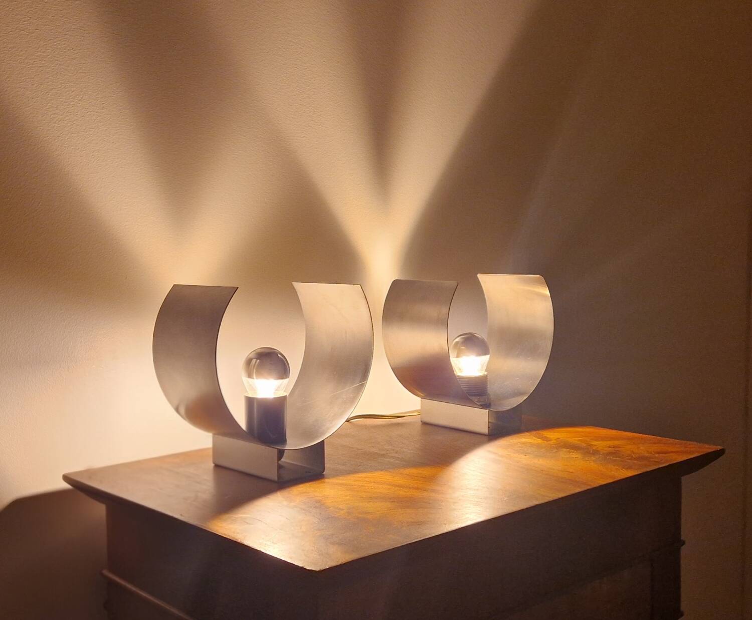 Pair of sculptural lamps in brushed metal – Design by Philippe Rogier