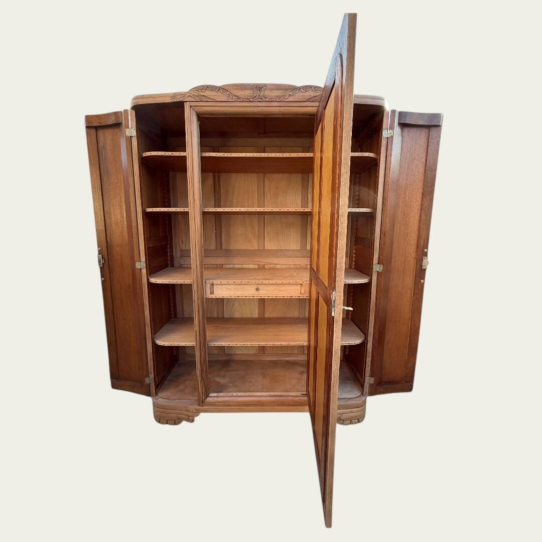Art Deco wardrobe with bevelled mirror in solid raw walnut.