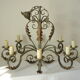 Lustre 8 branches en fer forgé patine gris de vert  et dorure ancien