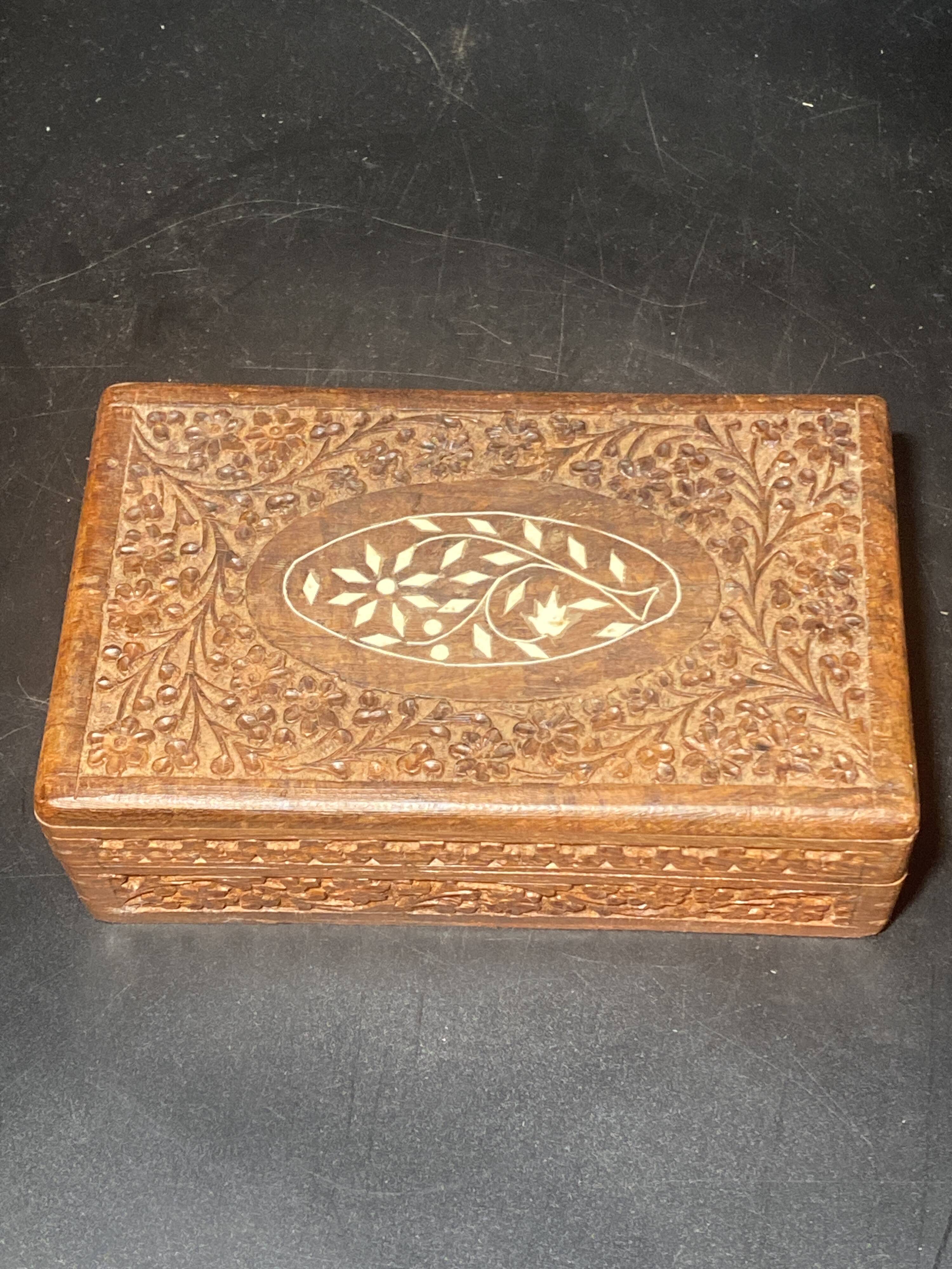 Carved wooden box