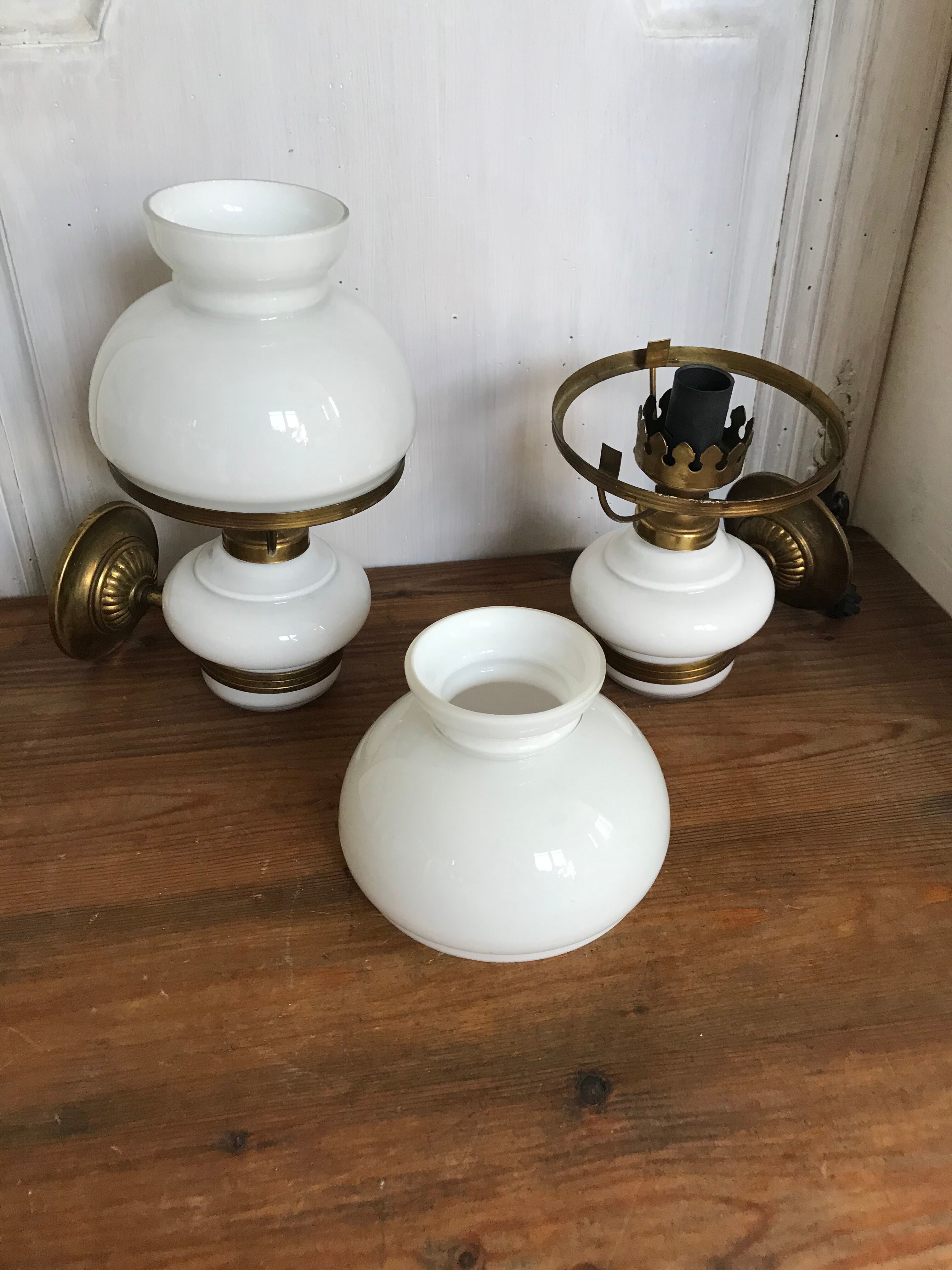 Pair of brass and opaline sconces