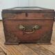Old Indian wooden wedding chest decorated with chiseled brass plaque. India late 19th/early 20th