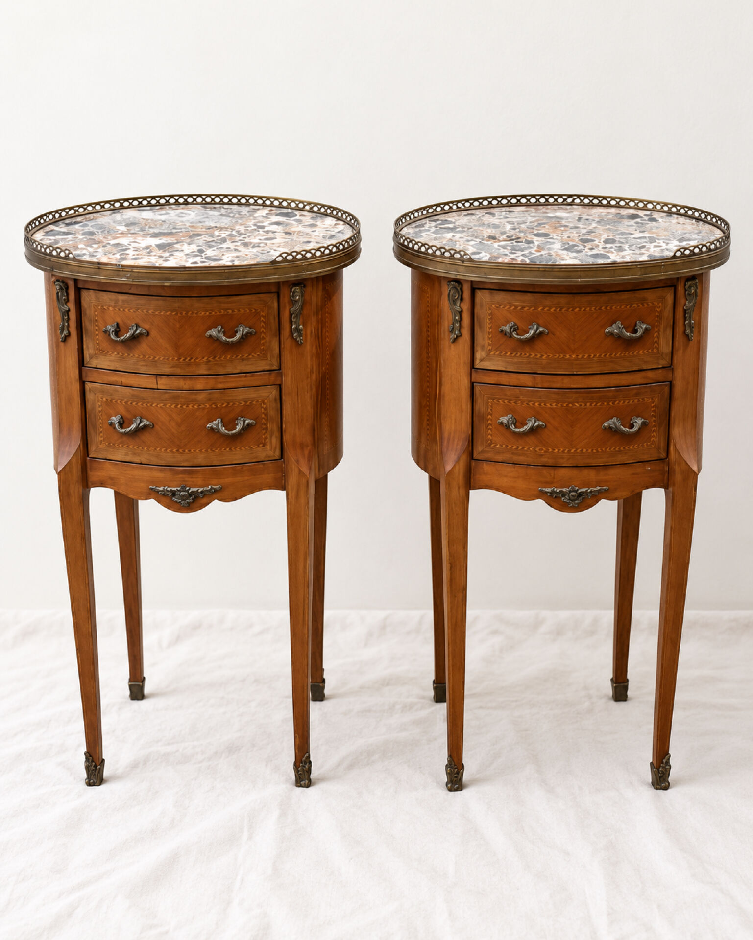 Pair of bedside tables with marquetry and marble, Louis XV style, openwork gallery.