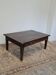 Rustic farmhouse coffee table from the 1900s with two drawers.