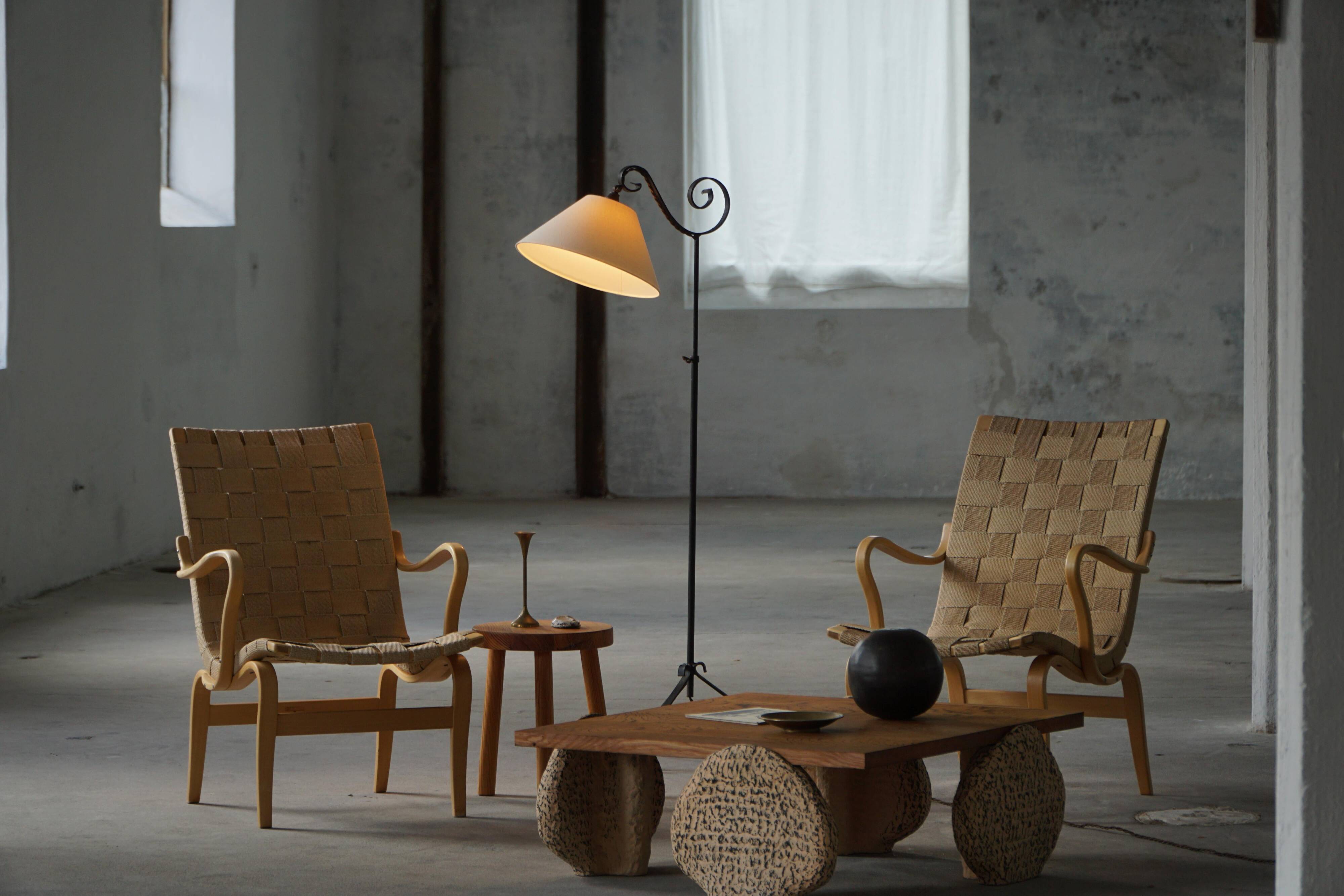 Pair of Swedish armchairs from the mid-century by Bruno Mathsson, model "Eva", 1960s.