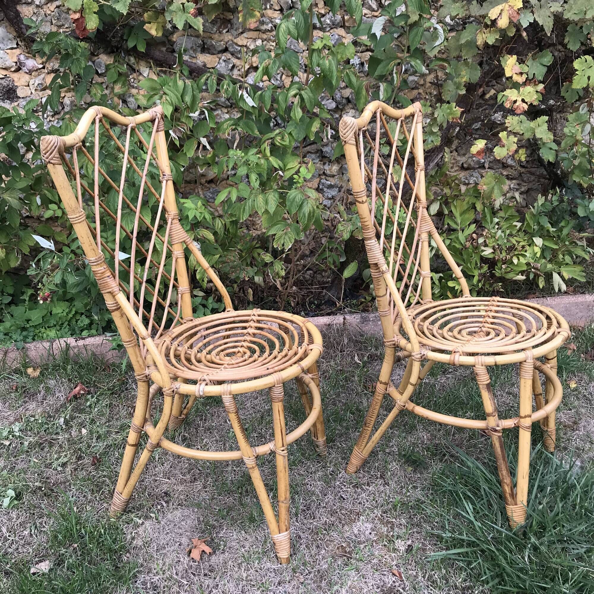 Pair of Louis Sognot chairs in vintage rattan 1960