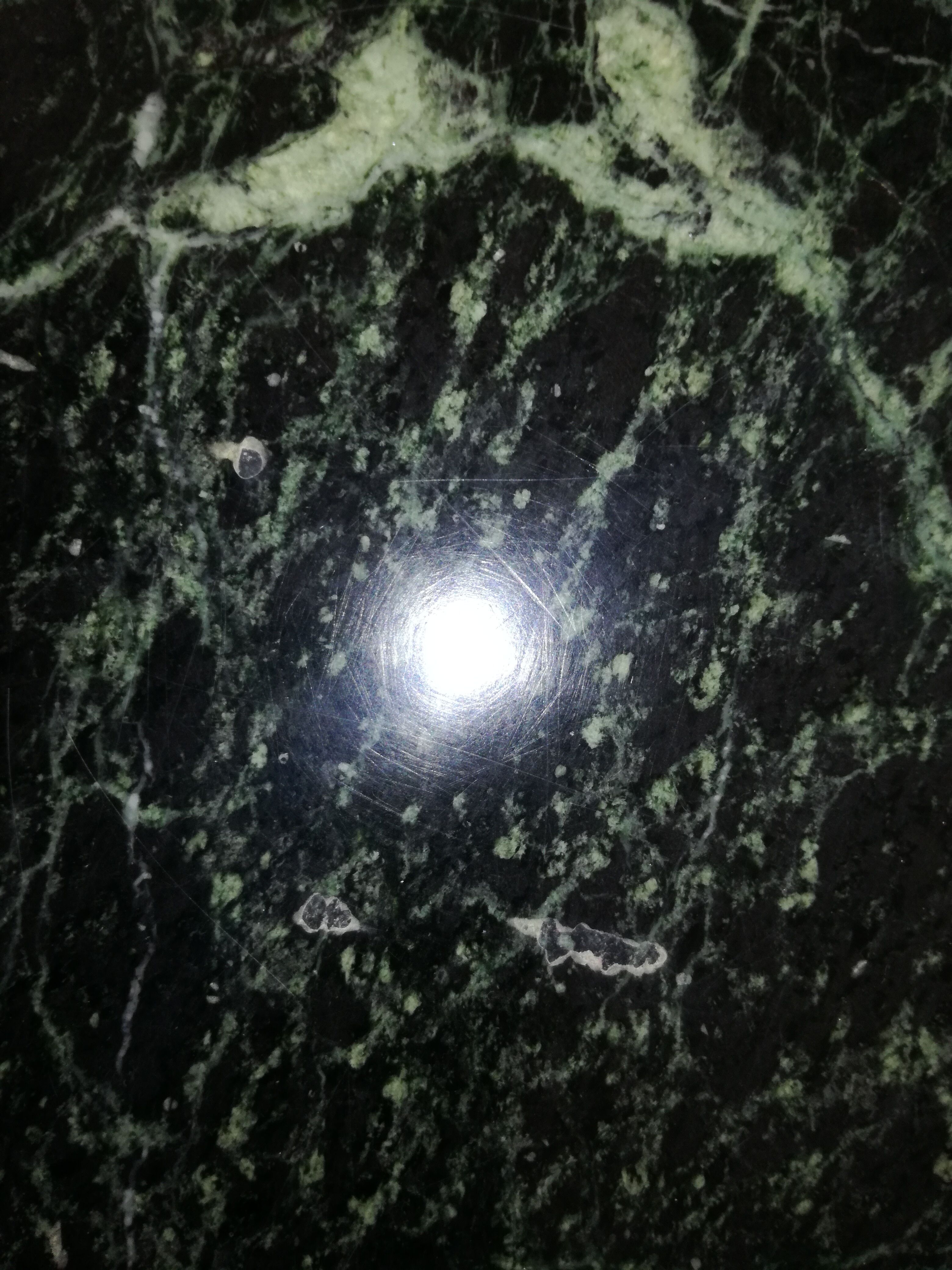 Coffee table in green marble and brass