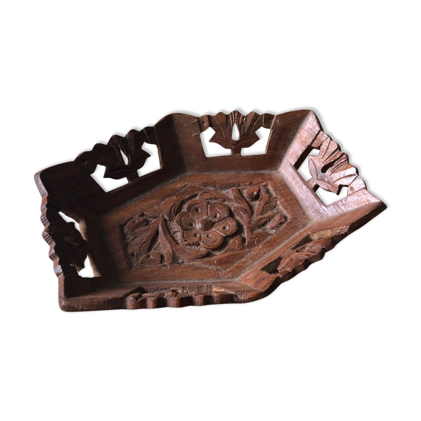 Empty carved rosewood pocket