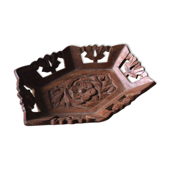 Empty carved rosewood pocket