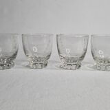 Set of four Art Deco style engraved crystal glasses on spherical feet