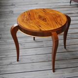 Table basse art déco de forme ronde en palissandre de rio.