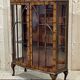 English Chippendale walnut display cabinet from the 1930s