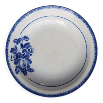 Antique shallow dish from Badonviller with blue flower decoration.