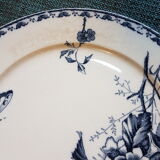 Pair of earthenware plates decorated with flowers