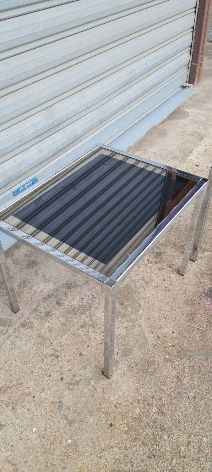 Pair of side tables in chrome metal and glass