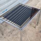 Pair of side tables in chrome metal and glass