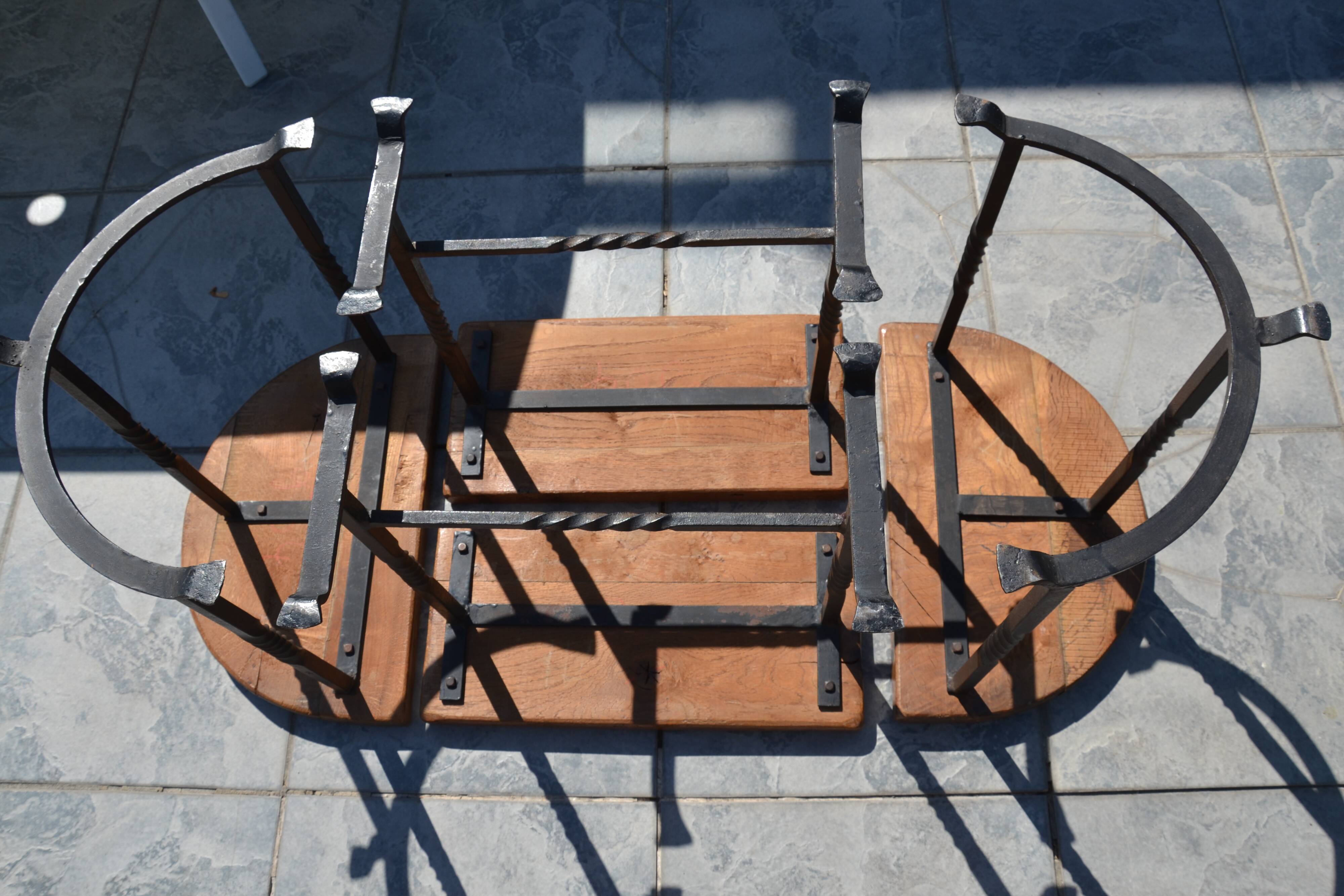 Unusual modular coffee table in oak and wrought iron.