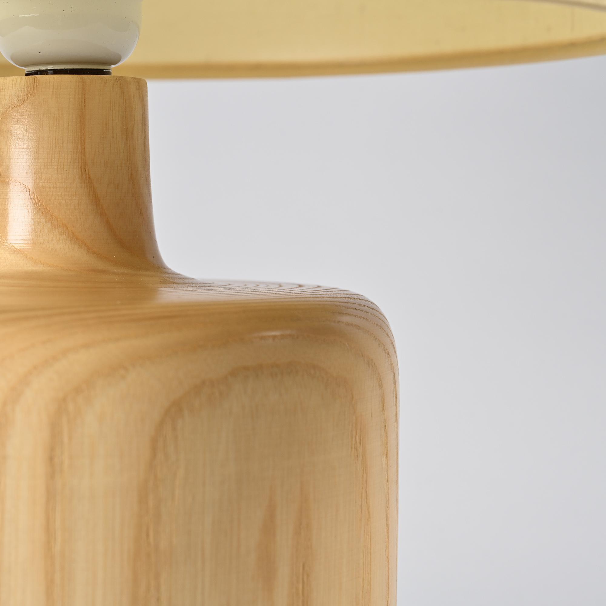 Table lamp in solid elm, France, circa 1970.