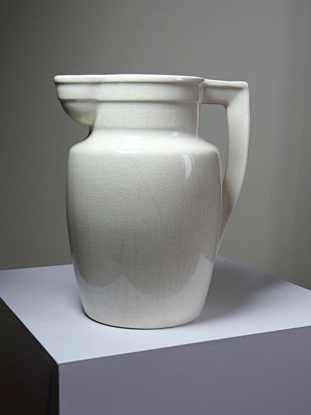 Large Art Deco toilet bowl, antique cracked faience.