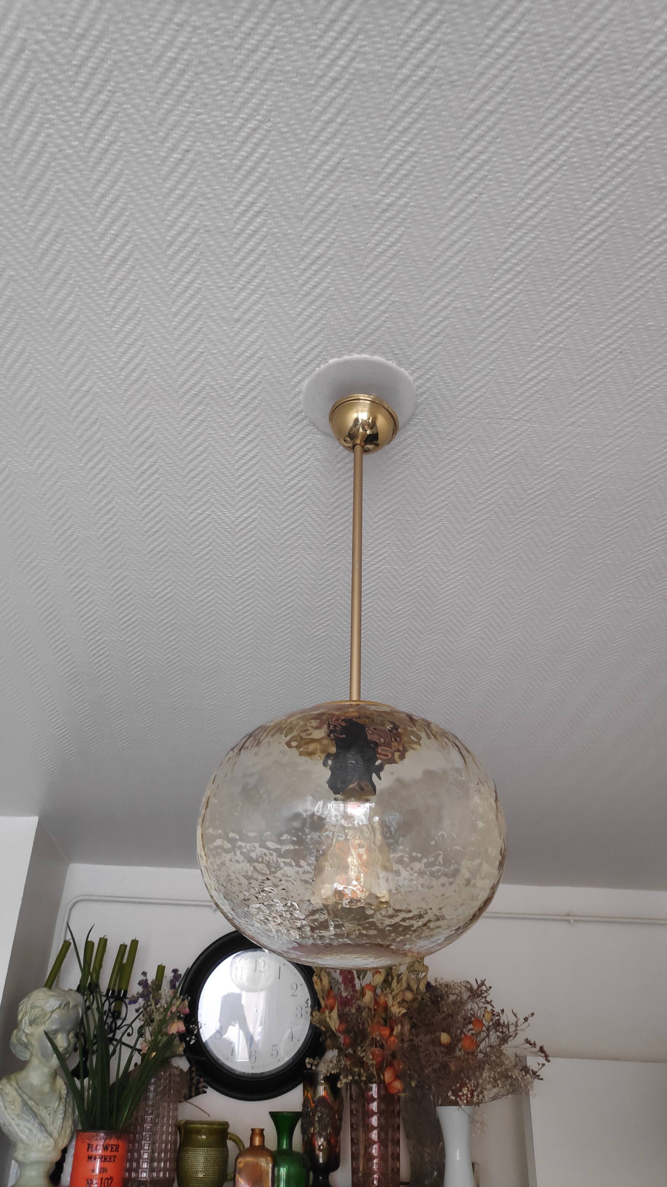 Vintage suspension globe in amber glass