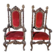 Paire de fauteuils anciens, sculptés en noyer.