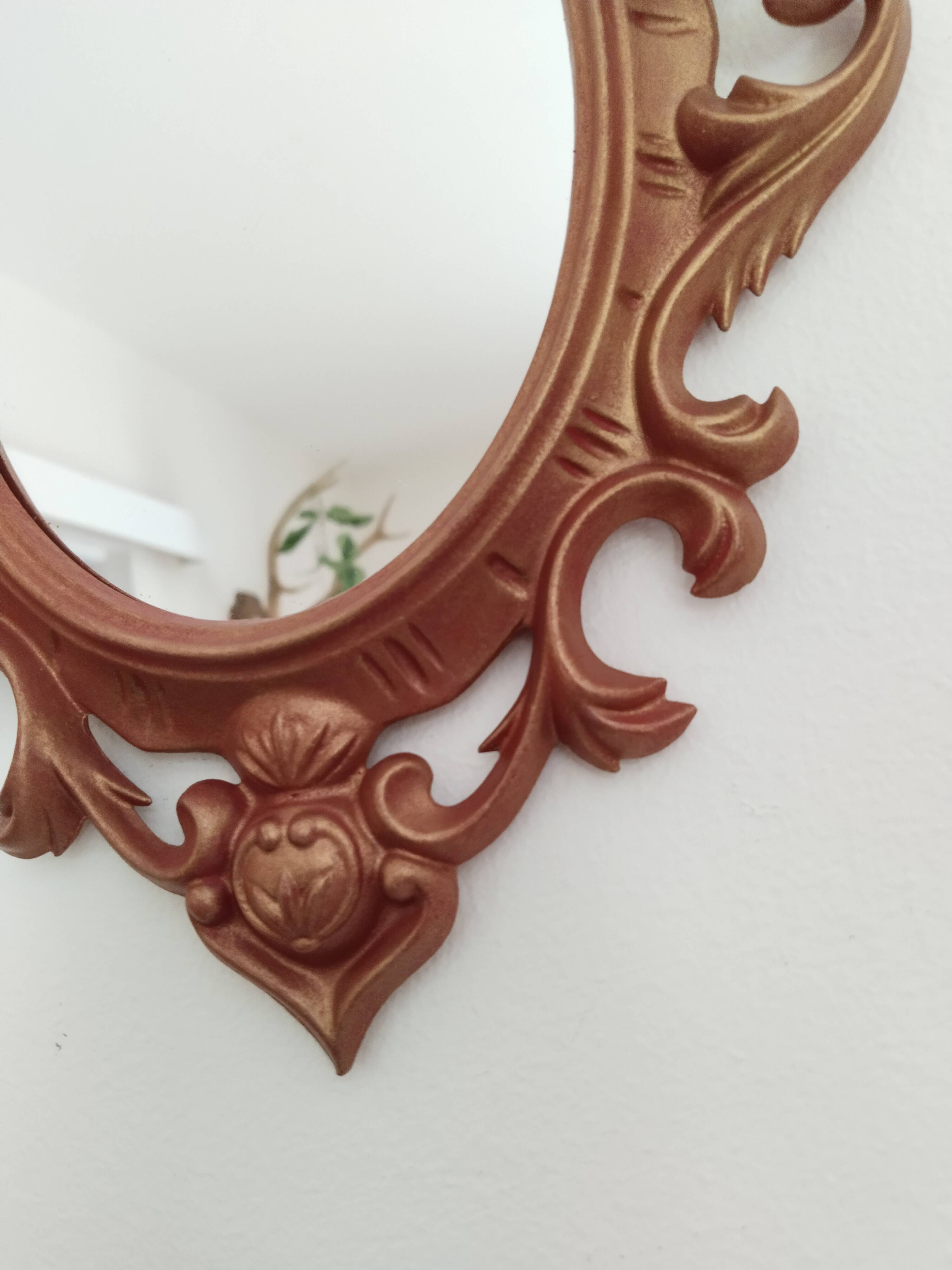 Classic red and gold patinated rocaille mirror, 35 cm x 23 cm