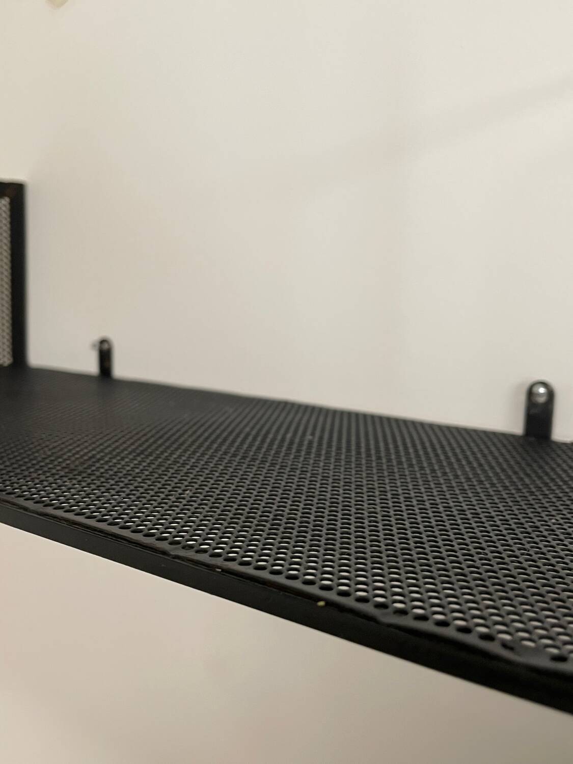 Wall shelf, 1956, Mathieu MATEGOT, perforated sheet metal