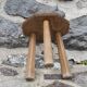 Raw wood tripod stool with octagonal seat