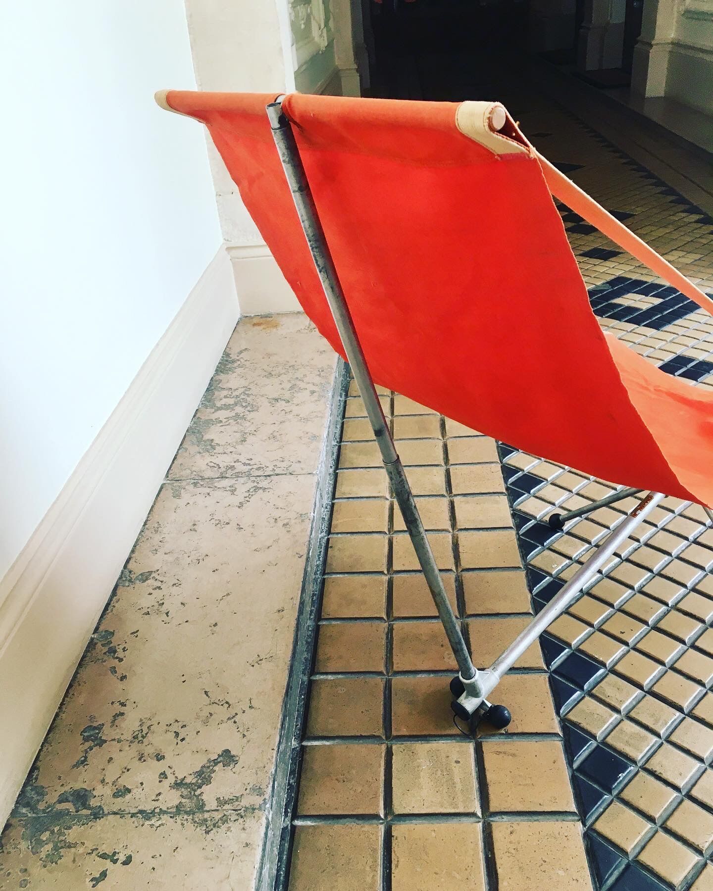 Orange detachable transamac seat circa 1955 by Lafuma