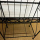 Antique wrought iron shelf