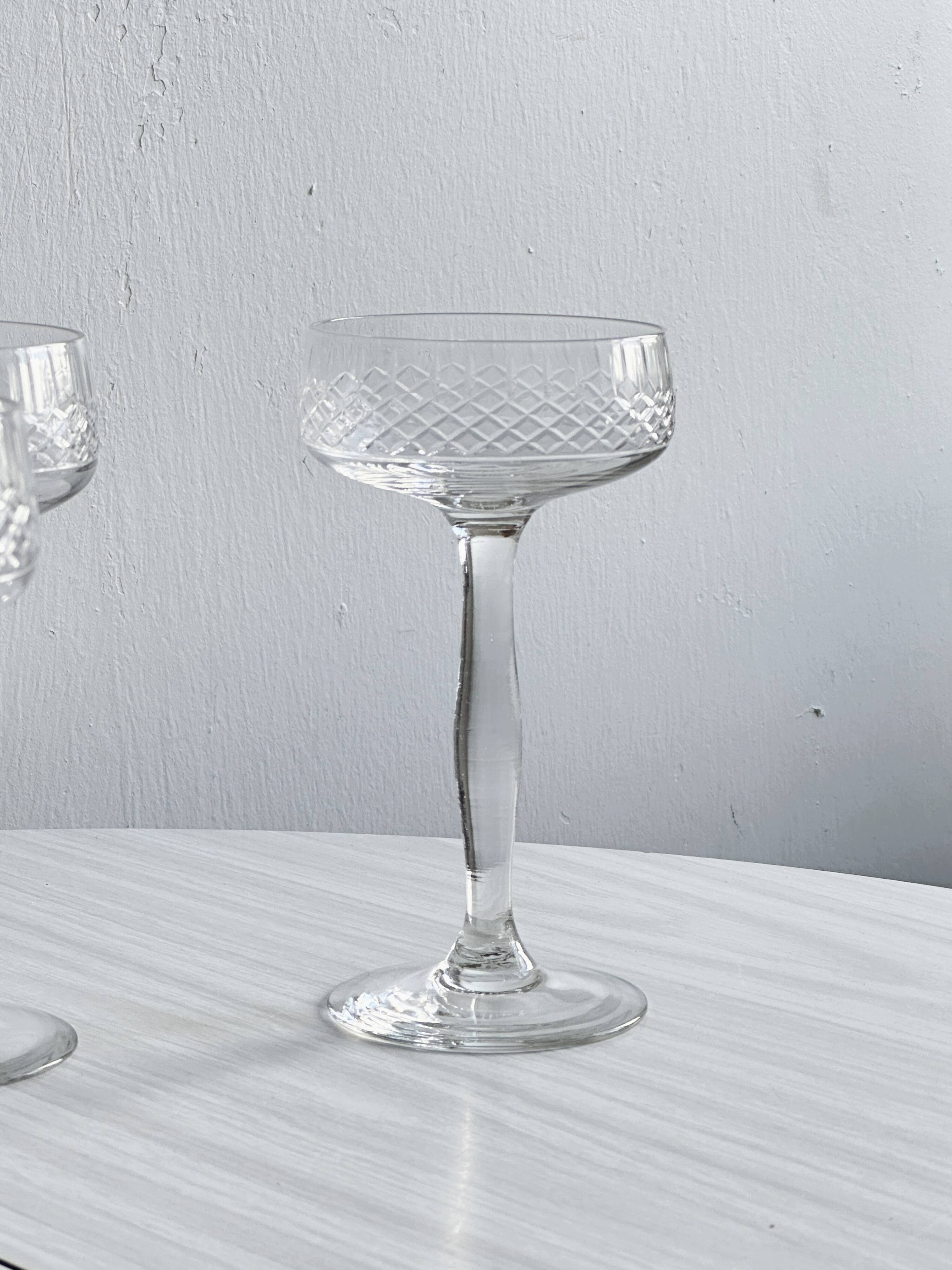 5 chiseled glass cocktail glasses.