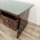 Art Deco executive desk in exotic wood, glass, and brass.