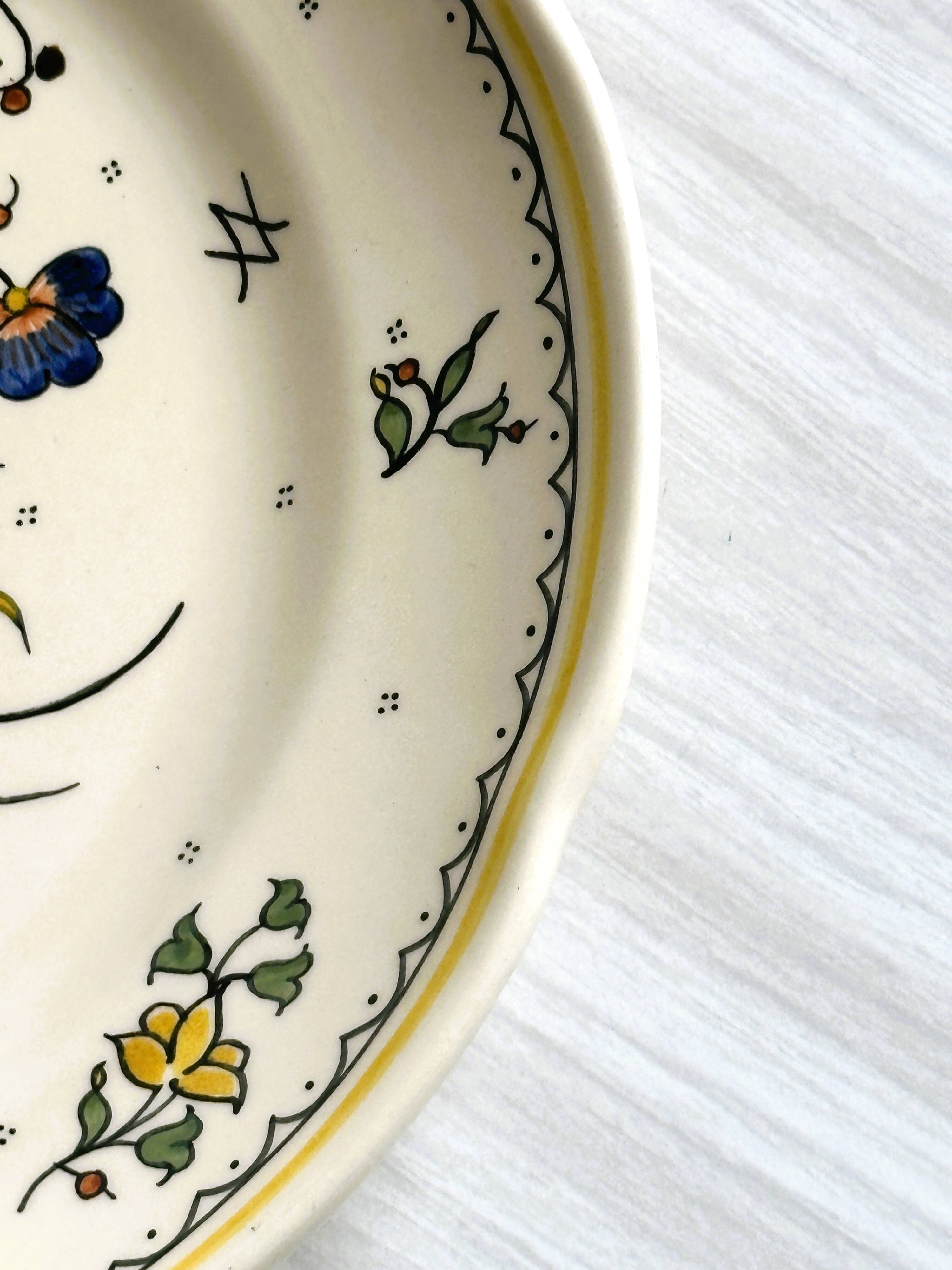 Earthenware plate, hand-painted floral and bird motif
