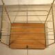 Side table - wooden and gold metal magazine rack