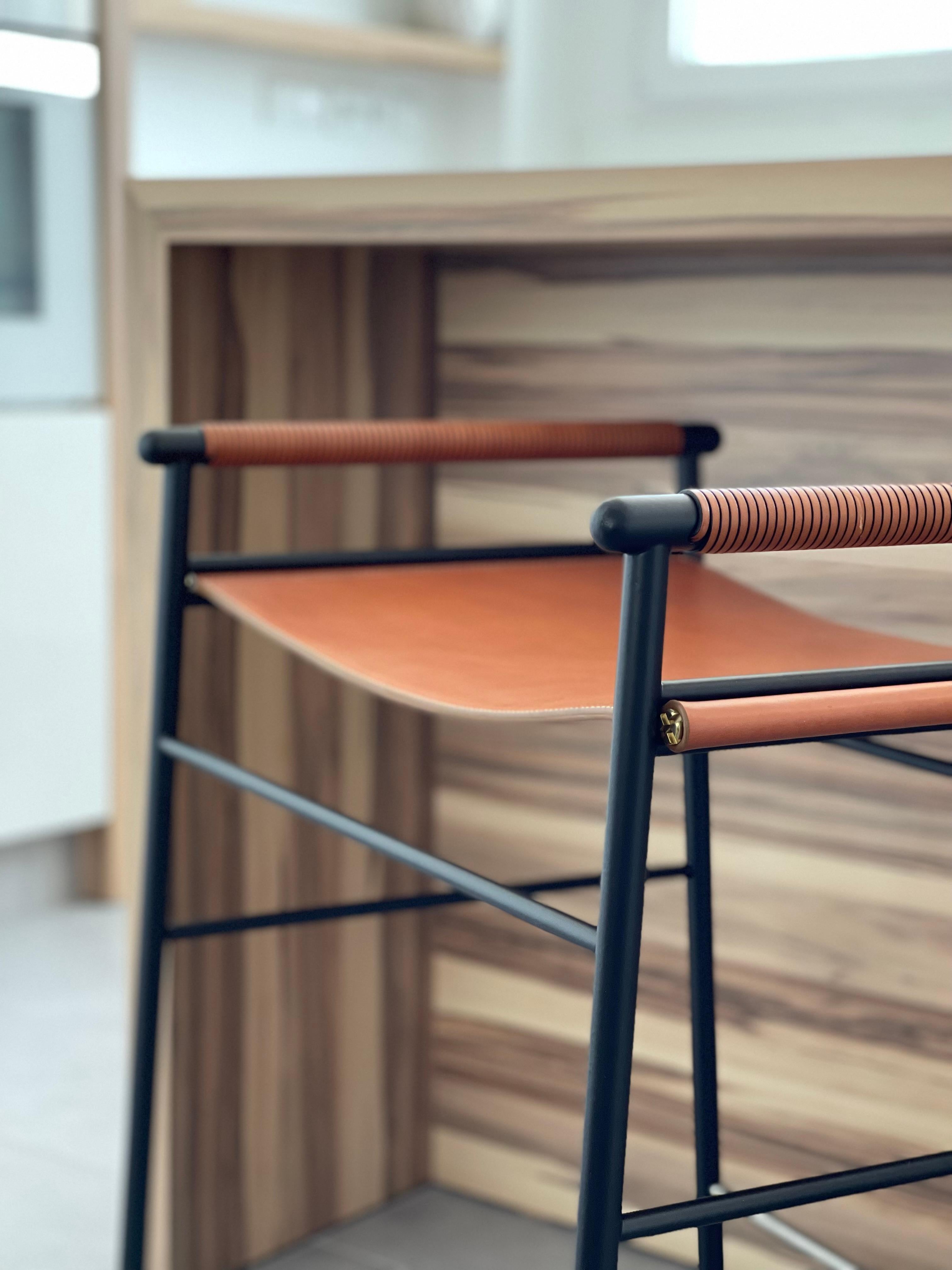 Artisan Contemporary bar stool, dark brown leather, black rubber metal.