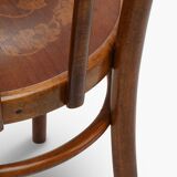 Bent wood chair with floral motif