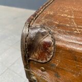 Antique brown travel case with wooden slides from the early 1900s