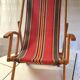 Vintage deck chair in wood and striped fabric - mid-20th century