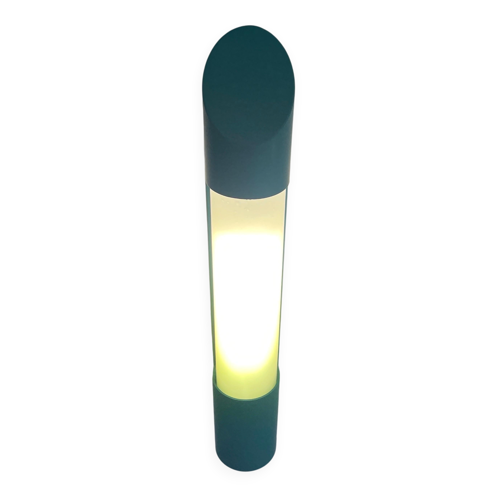 Simple cylindrical wall light in opal glass and turquoise metal, 1970s, Germany