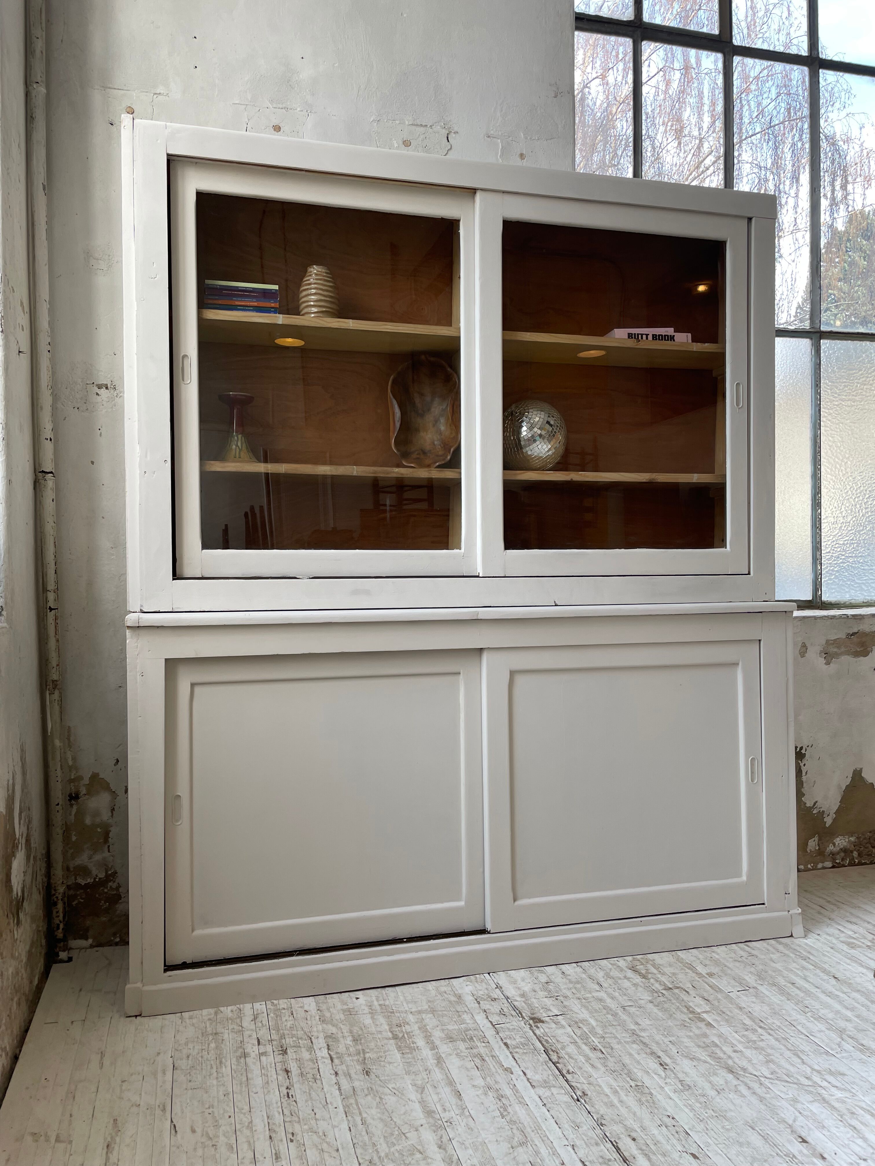 Library showcase ivory white sliding doors