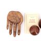 Empty wooden pocket in the shape of a hand, vintage