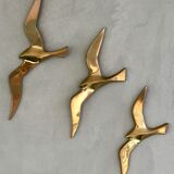 Trio of brass birds