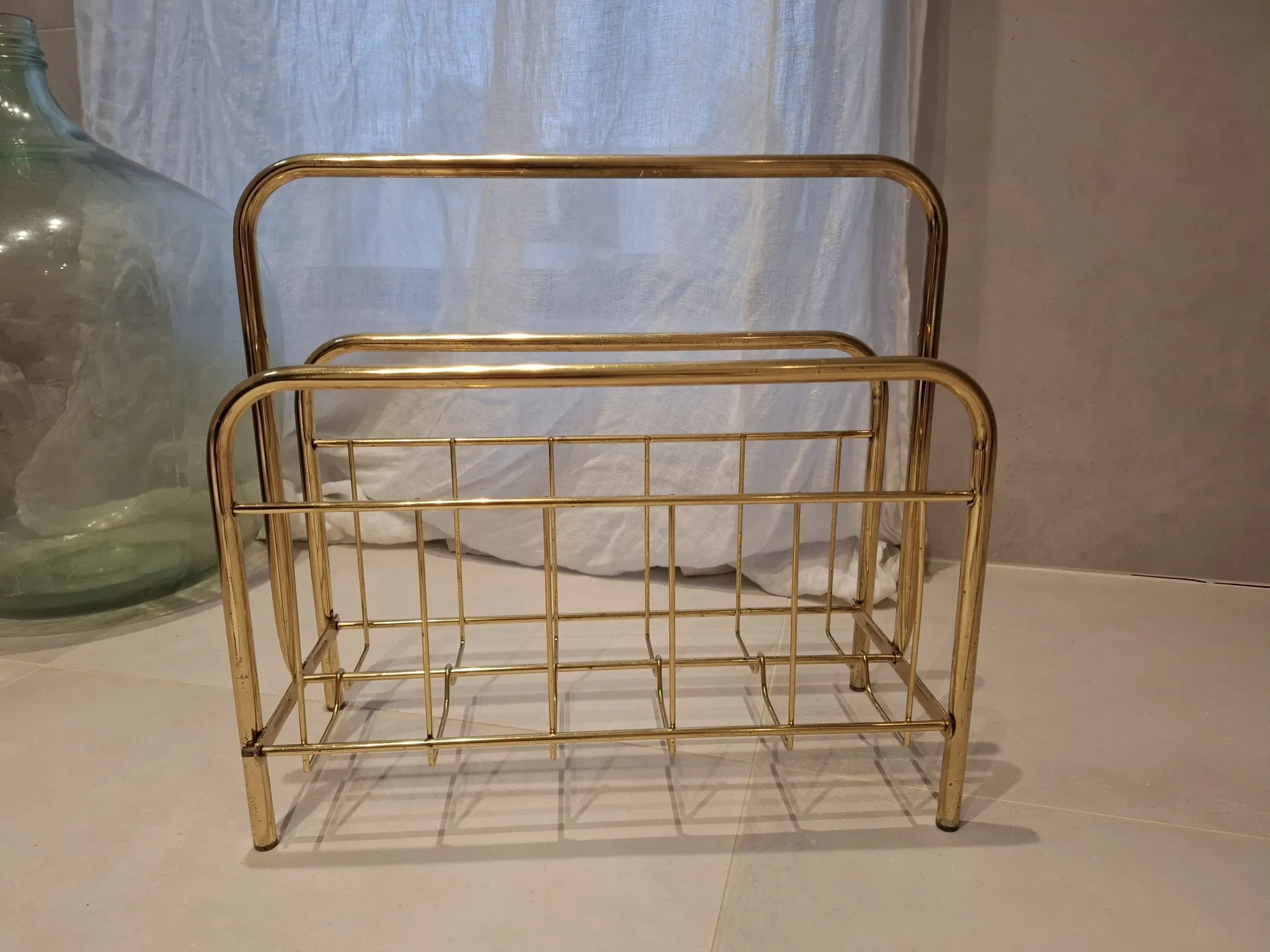 Golden metal magazine rack