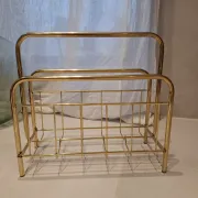 Golden metal magazine rack