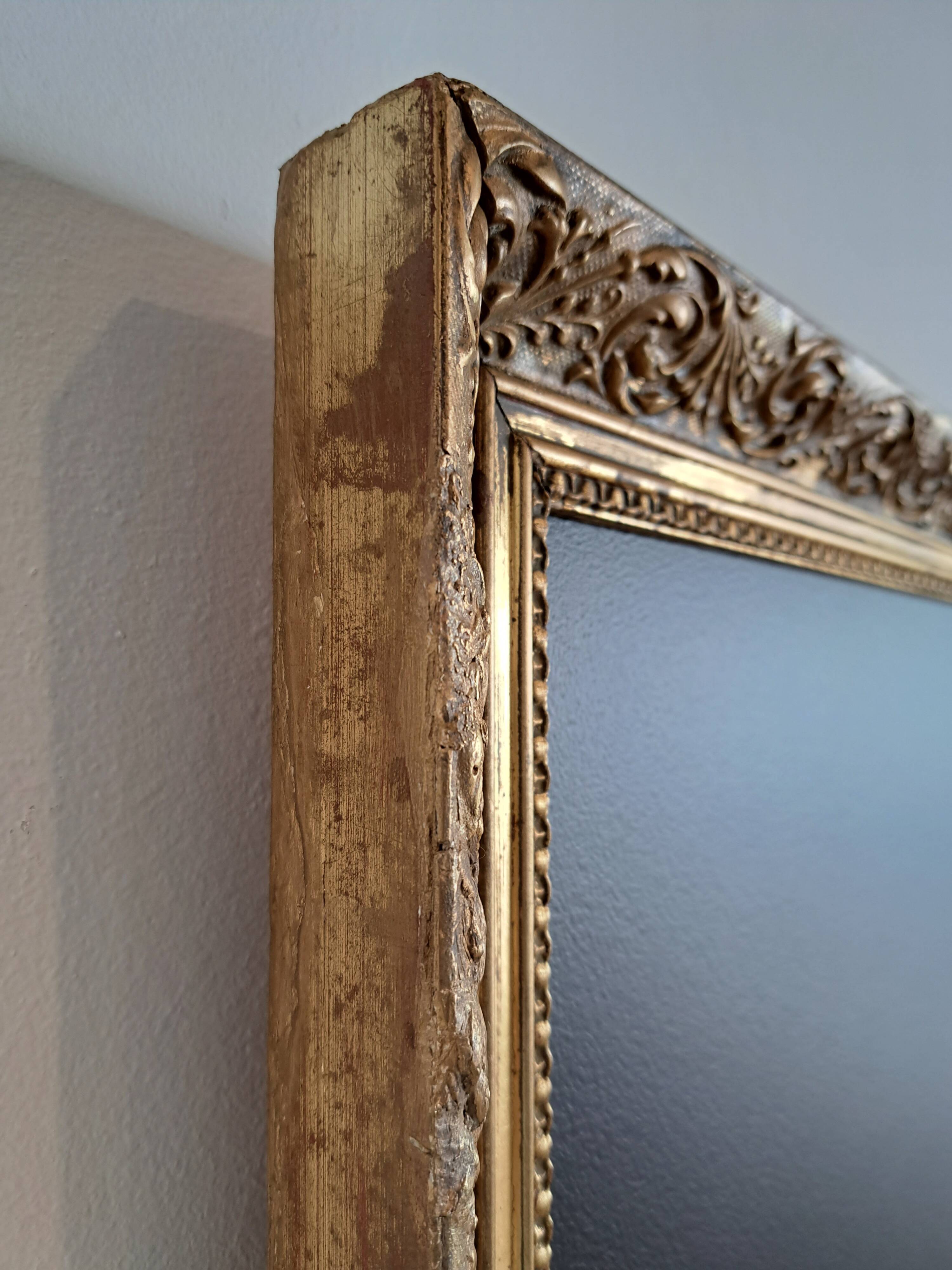 Slate table framed in gold leaf style