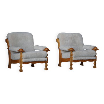 Henning Kjærnulf, lounge chairs in oak and lambswool, mid-century Danish, 1960s.